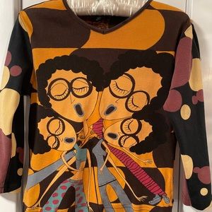 RARE Custo Barcelona design in warm tones. Sing your heart out with this one!